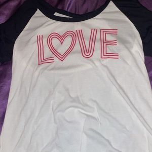 Love shirt, has cute little slits on the sleeve